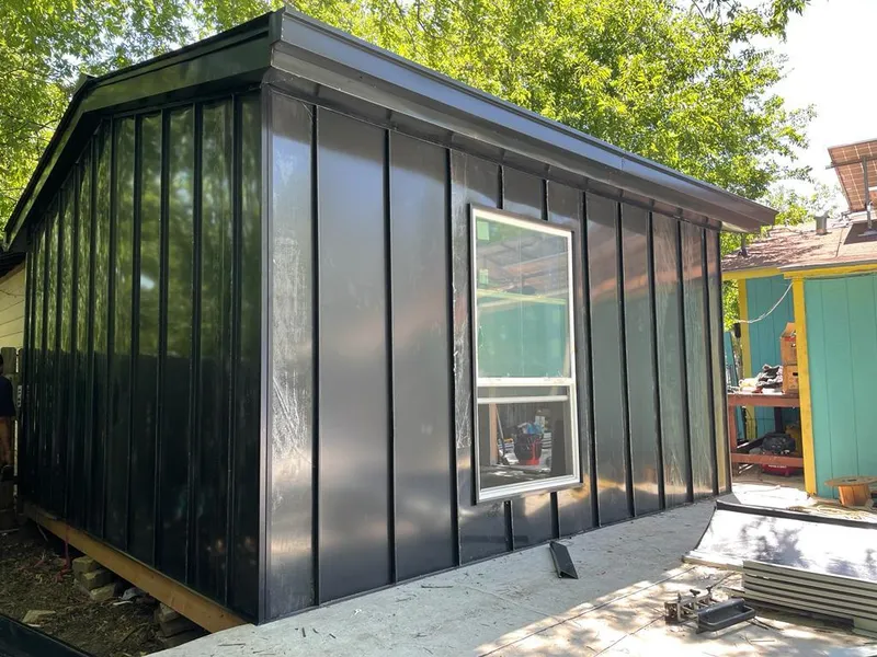 Black standing seam metal wall panels for Metal Roof Installation in Winona