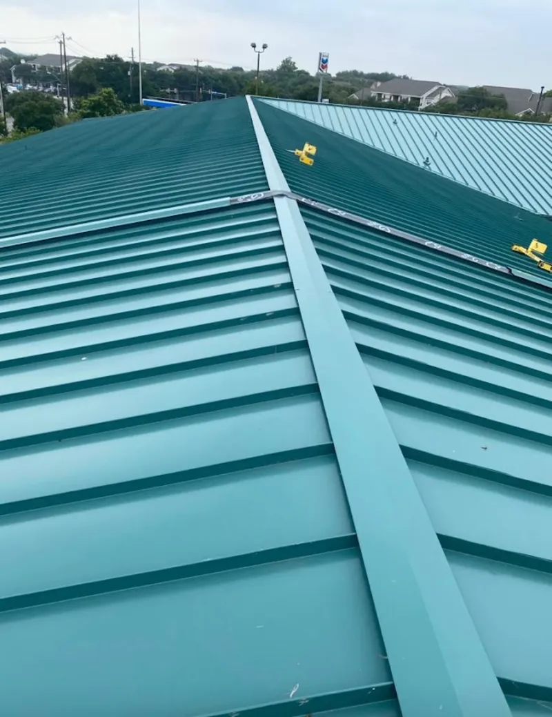 Green commercial metal roof ridge and valley for Metal Roof Repair in Winona