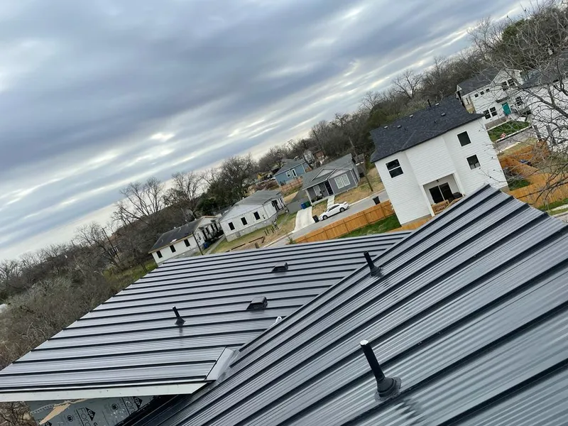 Standing seam metal roof panels with vents for Skylight Repair in Winona